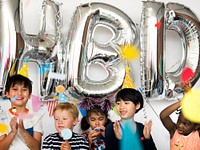 Young children attending a birthday party