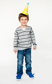 Young boy standing and posing for photoshoot