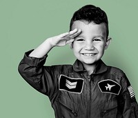 Little boy with pilot dream job salute and smiling