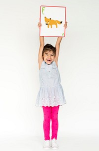 Happiness school kid smiling and holding alphabet animal placard