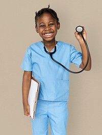 Little girl with doctor dream job smiling