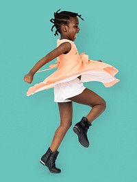 African little girl playful dancing studio portrait