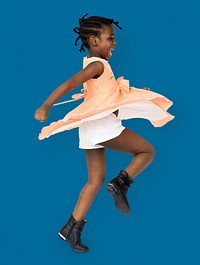 African little girl playful dancing studio portrait