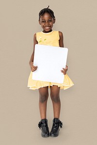 African little girl holding blank placard studio portrait