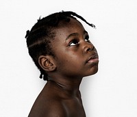 African Descent Boy Looks Up Focused Concentrated