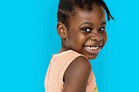 African little girl turn back and smiling studio portrait
