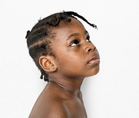 African Descent Boy Looks Up Focused Concentrated
