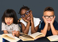 Diverse Group Of Kids Study Read Book