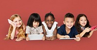 Diverse Group of Kids Using Electronic Devices