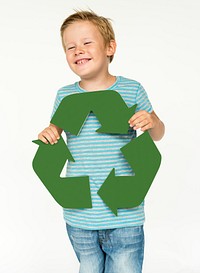 A boy holding Recycle symbol 
