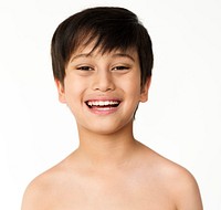 Boy shirtless smiling studio shoot