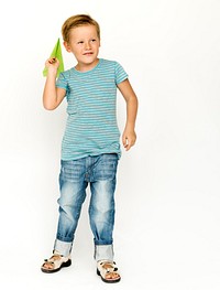 Boy playing paper plane handicraft