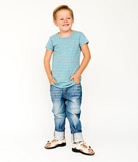 Young boy standing and posing for photoshoot