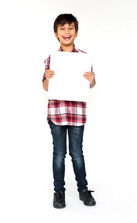 Kid holding empty paper board for advertising