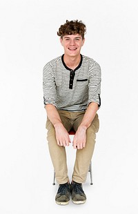 Young Adult Man Sitting with Smile Face Studio Portrait