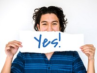 Young Man Showing with Yes Paper Board