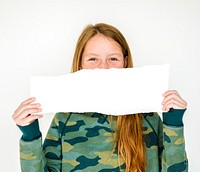 Young girl holding empty paper on white background