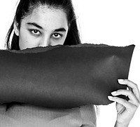 Young girl holding empty paper on white background