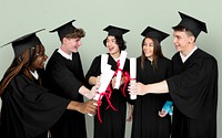 Diverse Group Of Students Holding Diploma