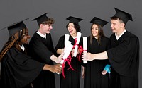 Diverse Group Of Students Holding Diploma