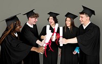 Diverse Group Of Students Holding Diploma