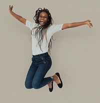 African woman jumping active smiling