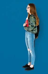 Young Adult Holding Books and School Bag Studio Portrait