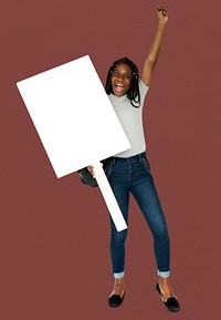 African girl arms raised and holding blank banner