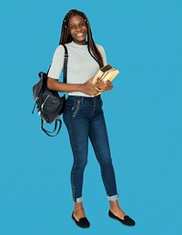 African girl student smiling and holding textbook