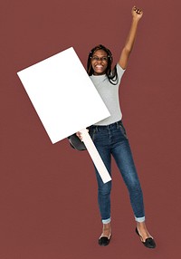 African girl arms raised and holding blank banner