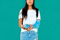 Young Adult Woman with Broken Arm Studio Portrait