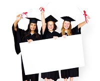 Diverse Students wearing Cap and Gown Showing Blank Copy Space Studio Portrait