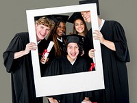 Diverse Students wearing Cap and Gown Holding Photo Frame Studio Portrait