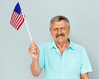Senior Adult Man Holding American Flag Patriotism Studio Portrait