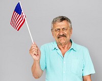 Senior Adult Man Holding American Flag Patriotism Studio Portrait