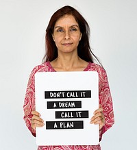 Woman holding target plan banner