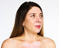 Woman bare chest naked smiling studio portrait