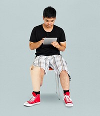 Disability Young Man with Prosthesis Leg Using Tablet Studio Portrait