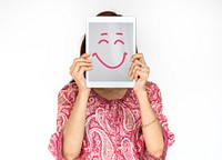 Woman holding digital device covering face photoshooting for photograph