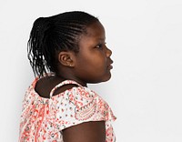 Little african girl casual studio portrait side view