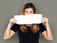 Adult Woman Holding Blank Paper Covered Face Studio Portrait