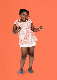 Little african girl having fun and dancing