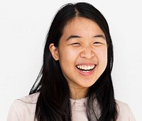 Young asian girl smiling studio portrait