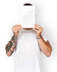 Man holding blank screen digital tablet