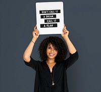 African descent woman holding placard