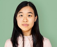 Young adult asian girl smiling casual studio portrait