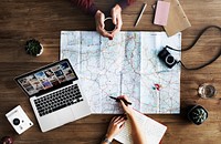 Map lying on wooden table