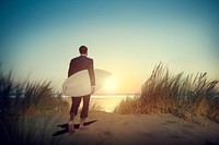 Lone Businessman by the Beach with Surfboard Concept