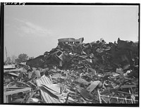 Conservation. Scrap iron and steel. Waste materials from heaps such as these are a rich source of scrap materials for conversion into vitally needed defense material. Efforts are now being made to collect all such materials to alleviate threatened shortages (U.S. Route 1, Baltimore-Washington Highway, August 1941)