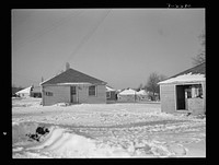 Bantam, Connecticut. War workers' homes. The war has brought approximately a thirty-three percent increase in housing facilities in Bantam--an eighty-unit federally financed housing project about five minutes from the Warren McArthur factory. The first forty units--two to a house, were occupied in early January 4, 1942 and the second forty had already been financed pending completion. As the automobiles and tires of workers in Bantam's defense industries wear out, it is probable that additional new housing facilities will be needed. Sourced from the Library of Congress.